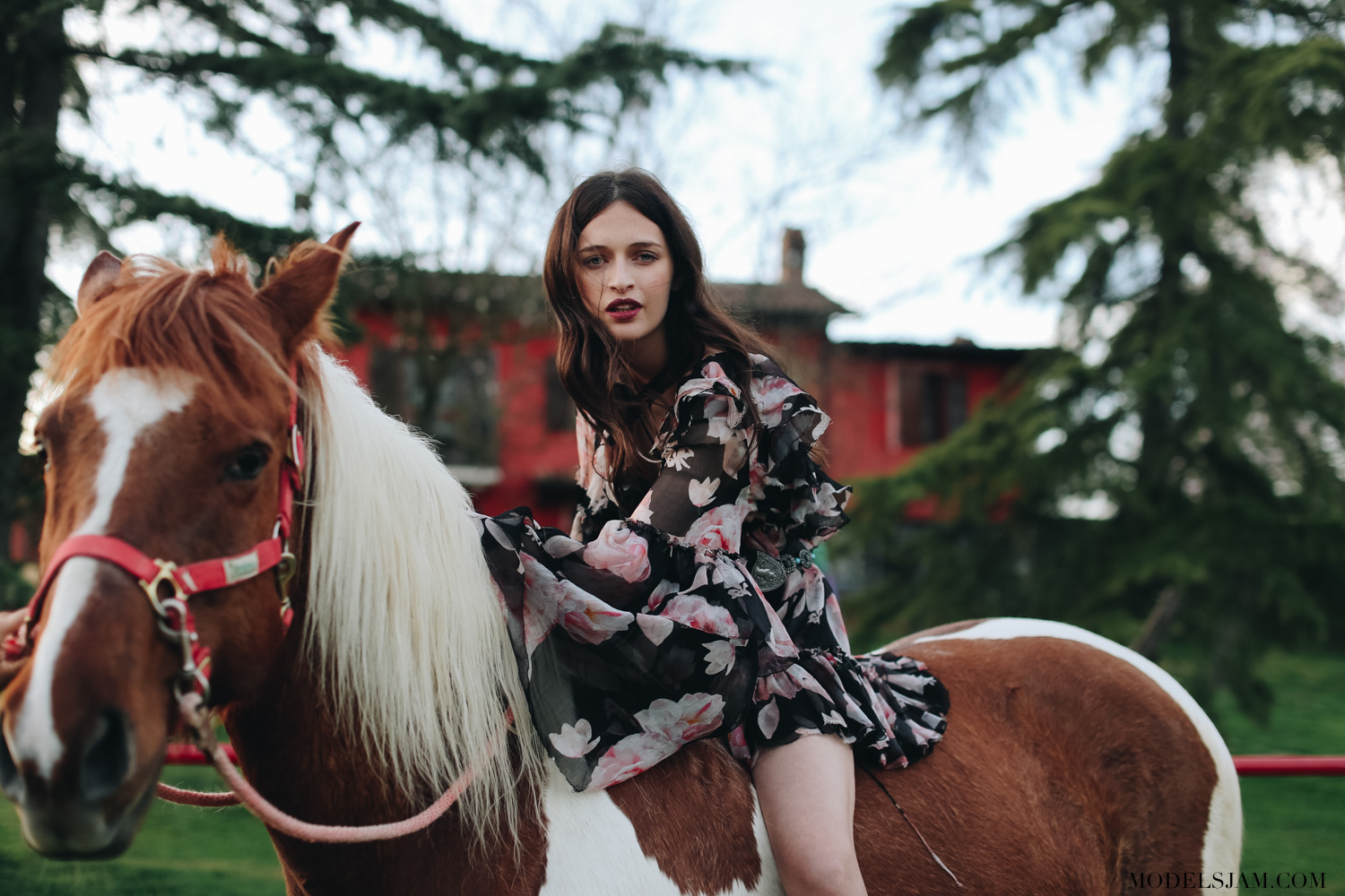 Benedetta Casaluce is photographed by Pier Grassano and styled by Angelica Ardasheva wearing Redemption silk dress for Models Jam editorial Spirit sauvage on horse
